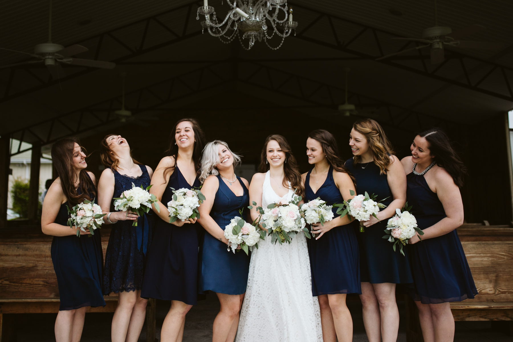 Navy bridesmaid dresses for a A Rustic Wedding at Barn in the Bend in Nashville, Tennessee