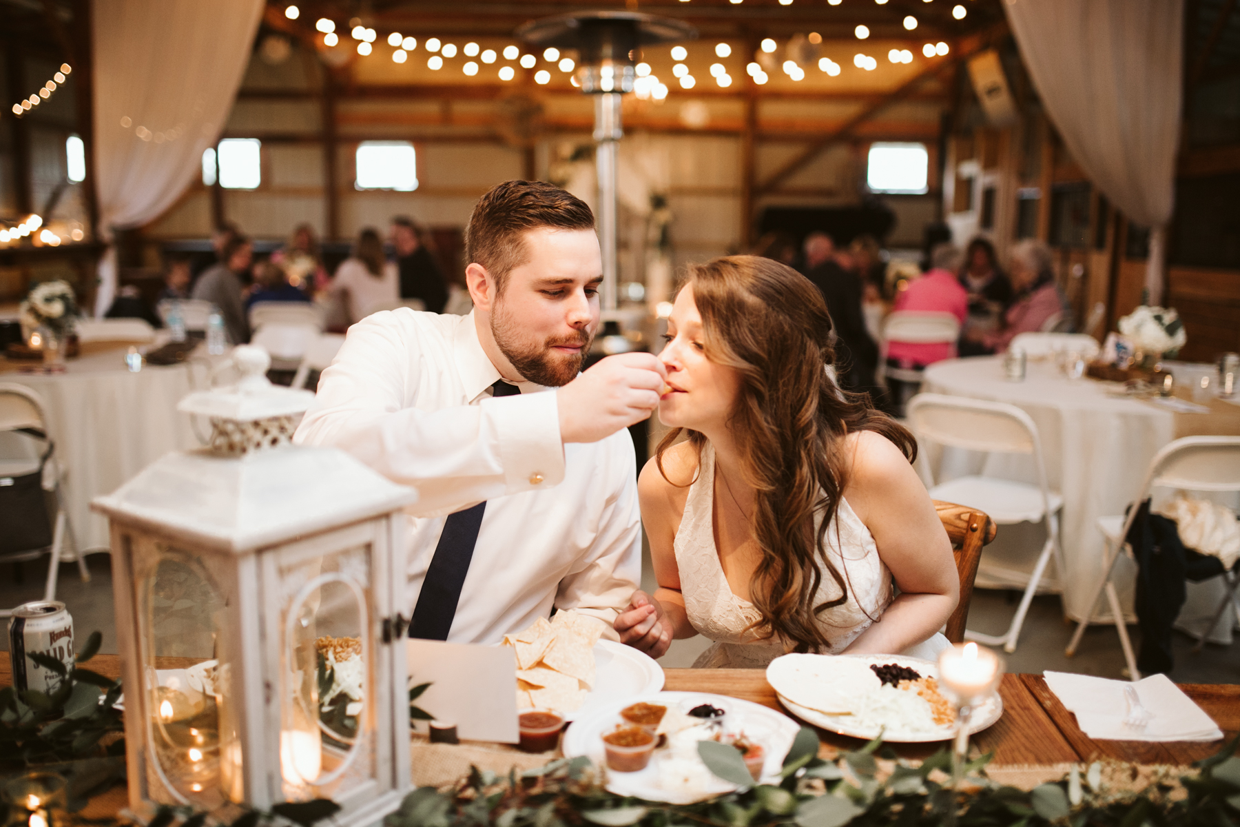 Bride and groom's first meal after A Rustic Wedding at Barn in the Bend in Nashville, Tennessee