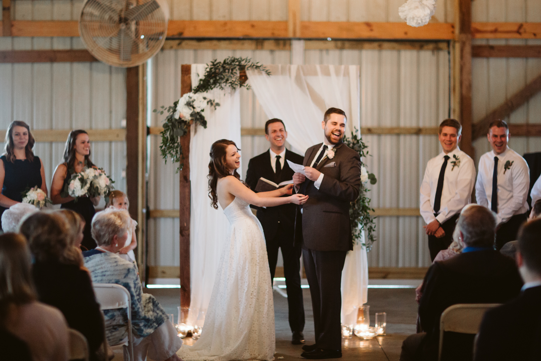 Bride and groom sharing vows at A Rustic Wedding at Barn in the Bend in Nashville, Tennessee