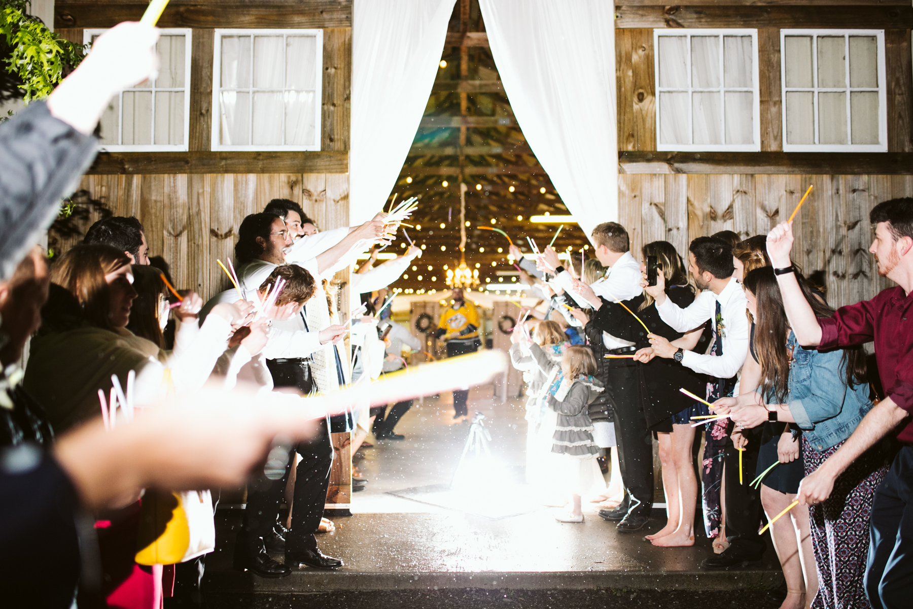 Glow stick exit after a rustic wedding at Barn in the Bend in Nashville, Tennessee