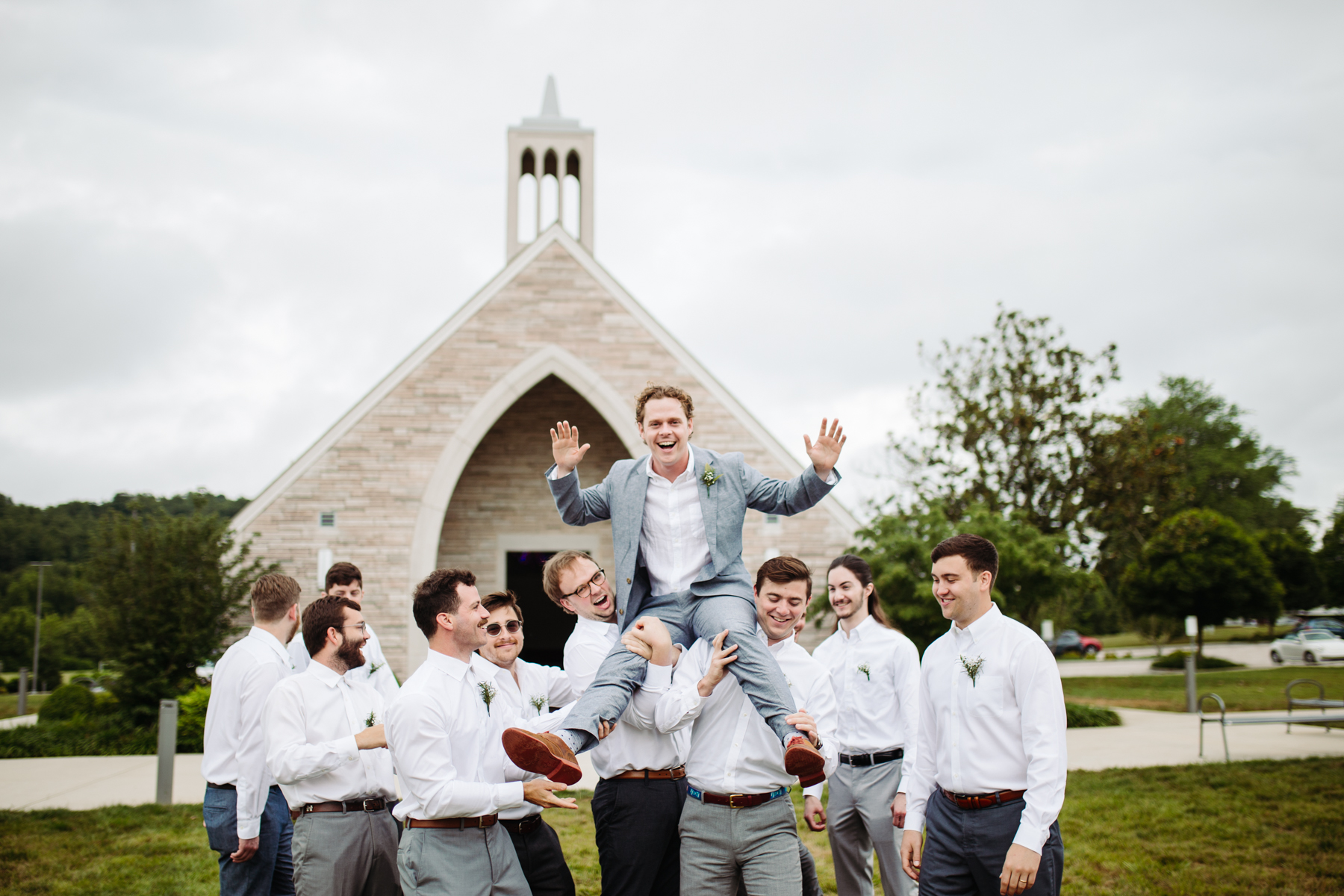 Groom and groomsmen photos at Lakeshore Chapel before a downtown knoxville wedding at redeemer church