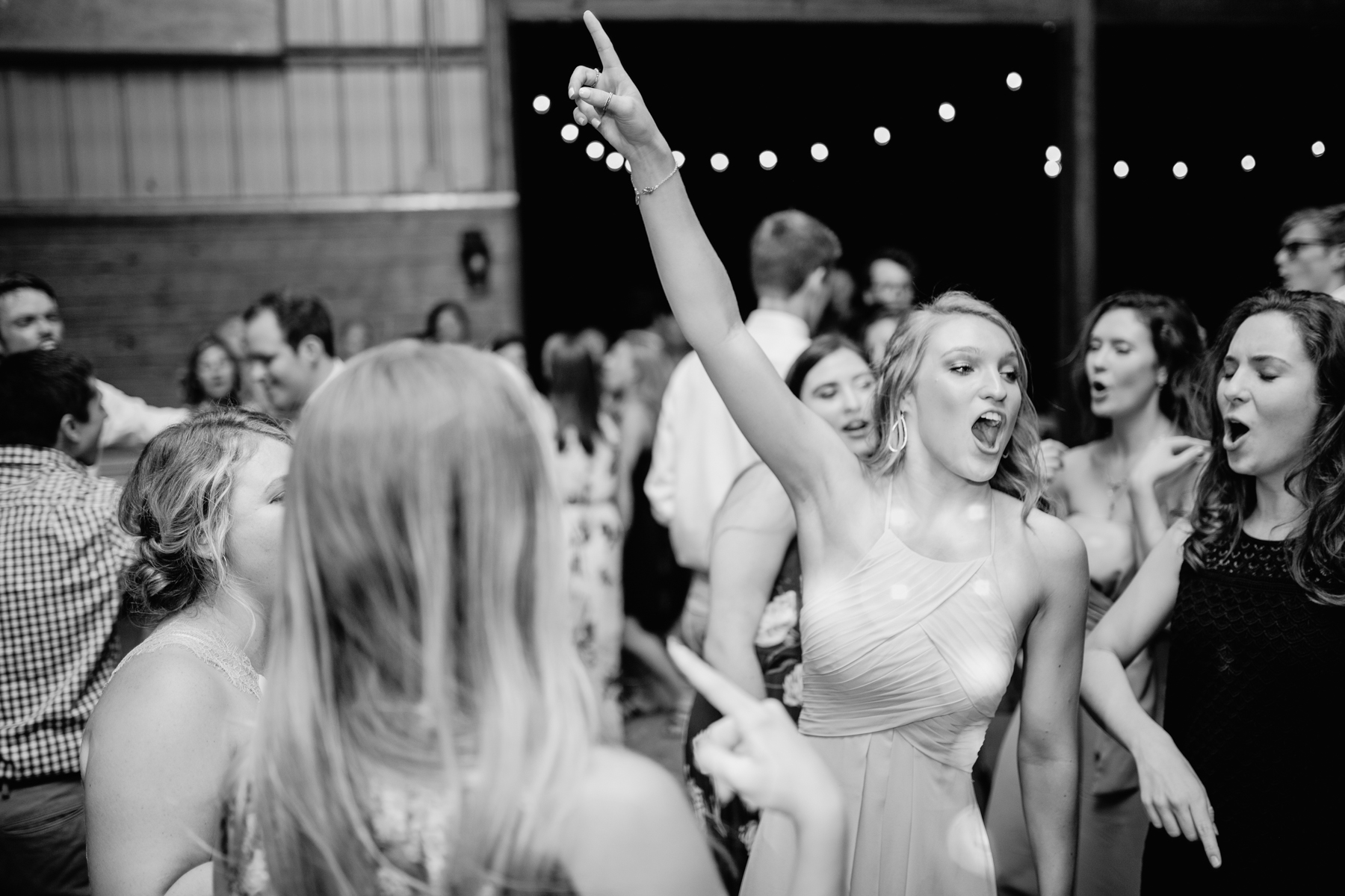 black and white dance floor photos at a stables at strawberry creek wedding in knoxville, tennessee