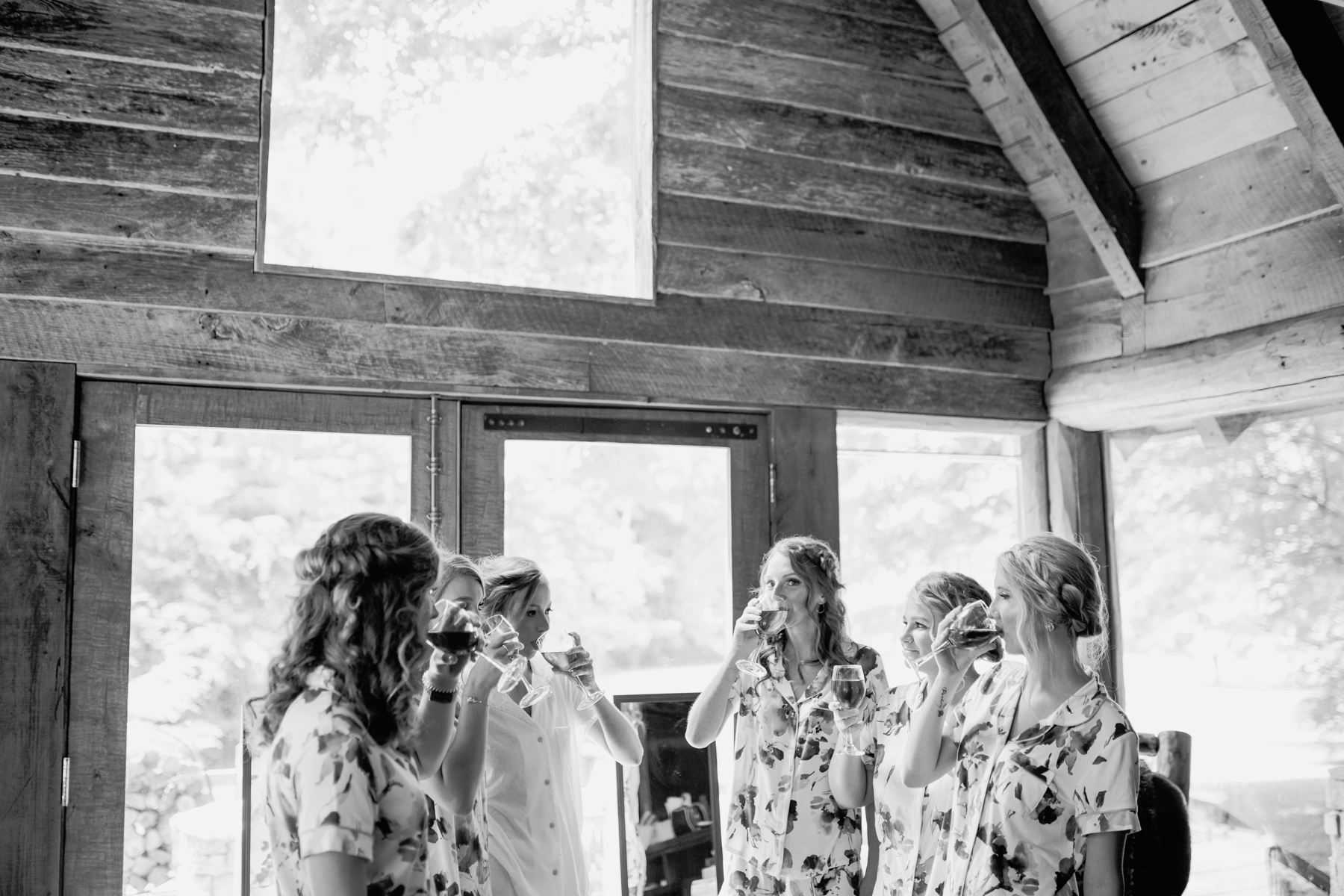 Bridesmaids give a toast before a stables at strawberry creek wedding in Knoxville, tennessee