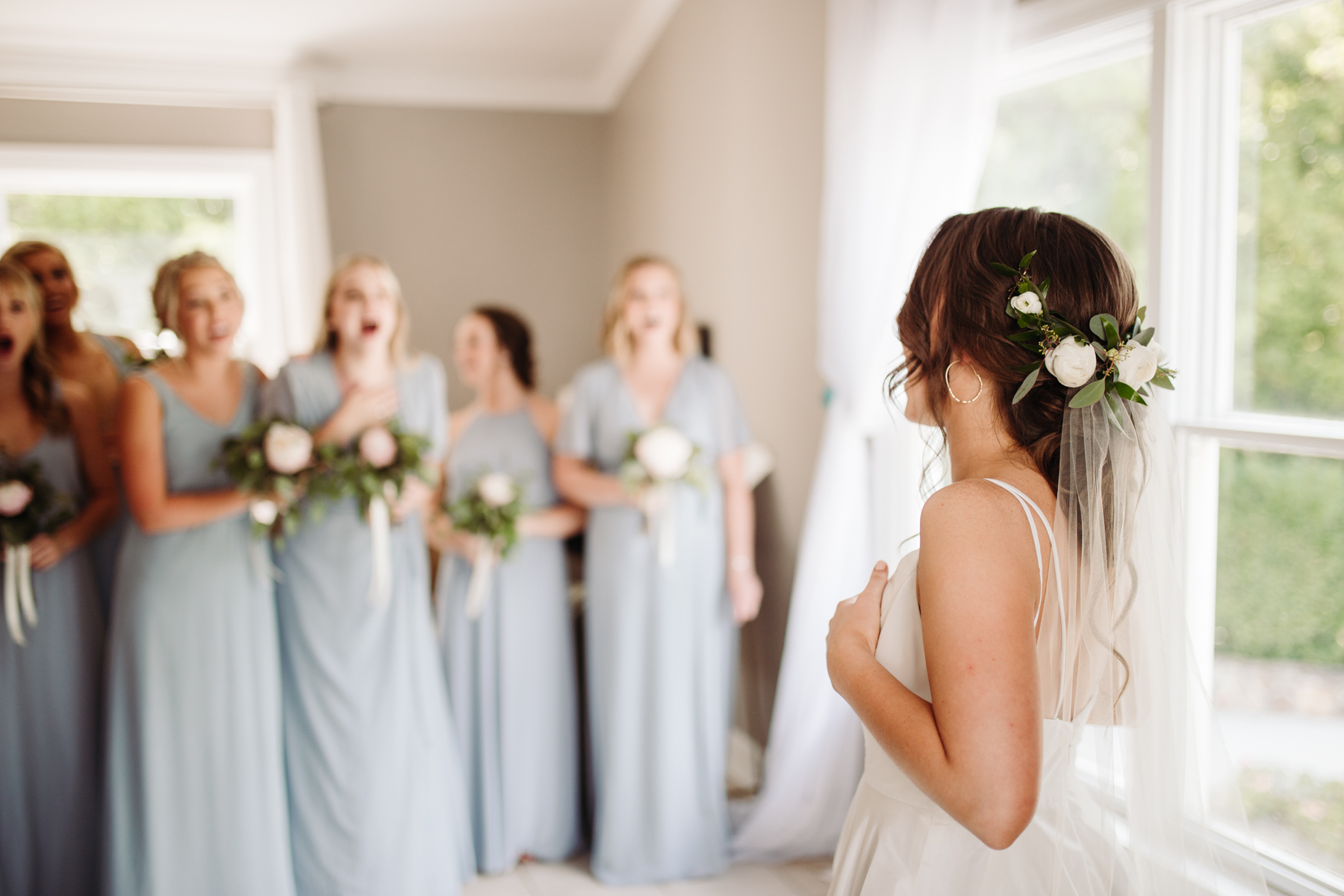 Bridesmaid reveal before a Sunny summer wedding at Dara's Garden in Knoxville, Tennessee 