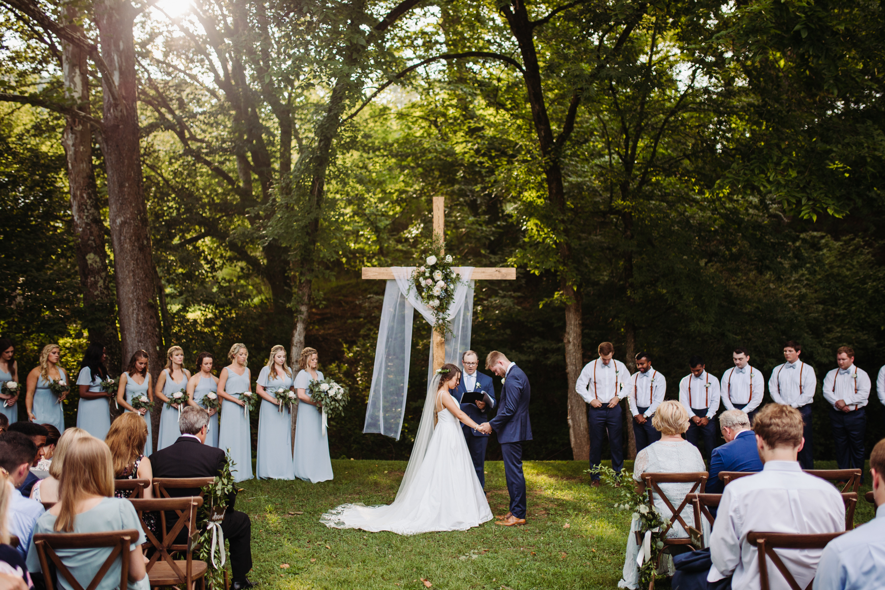Evening ceremony of a Sunny summer wedding at Dara's Garden in Knoxville, Tennessee 