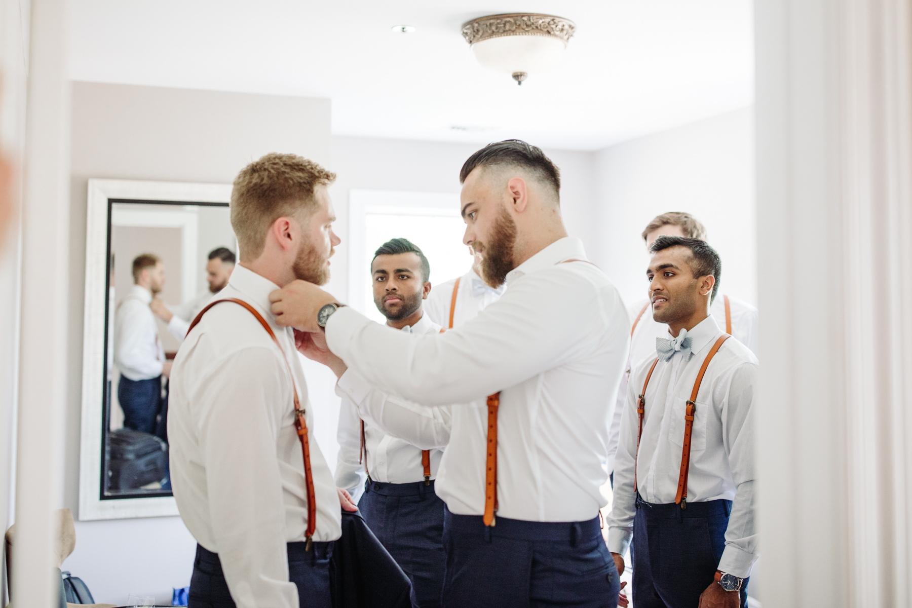 groomsmen getting ready at a Sunny summer wedding at Dara's Garden in Knoxville, Tennessee 