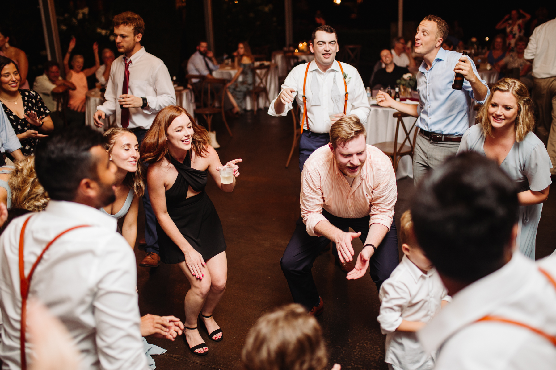 dance floor during the reception of a Sunny summer wedding at Dara's Garden in Knoxville, Tennessee 
