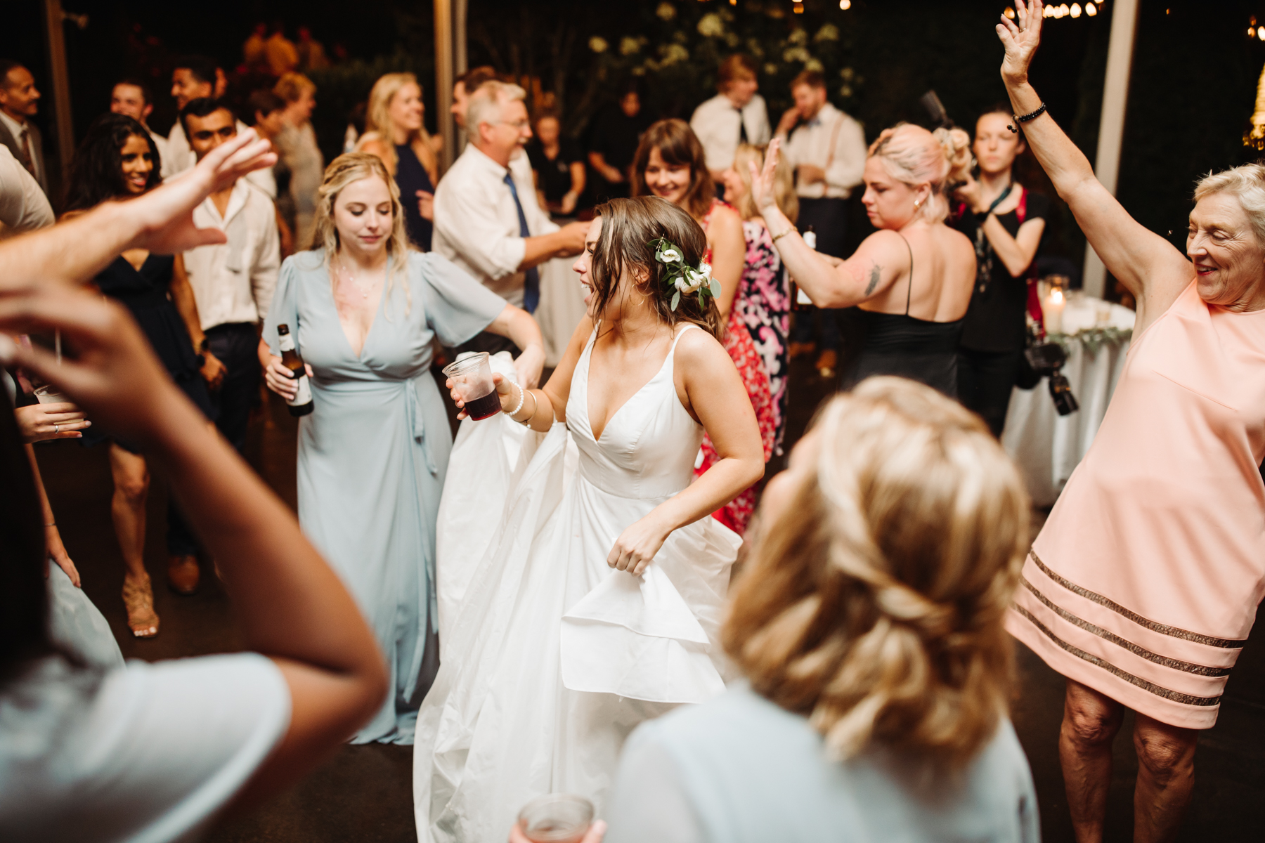 bride on the dance floor at a reception of a Sunny summer wedding at Dara's Garden in Knoxville, Tennessee