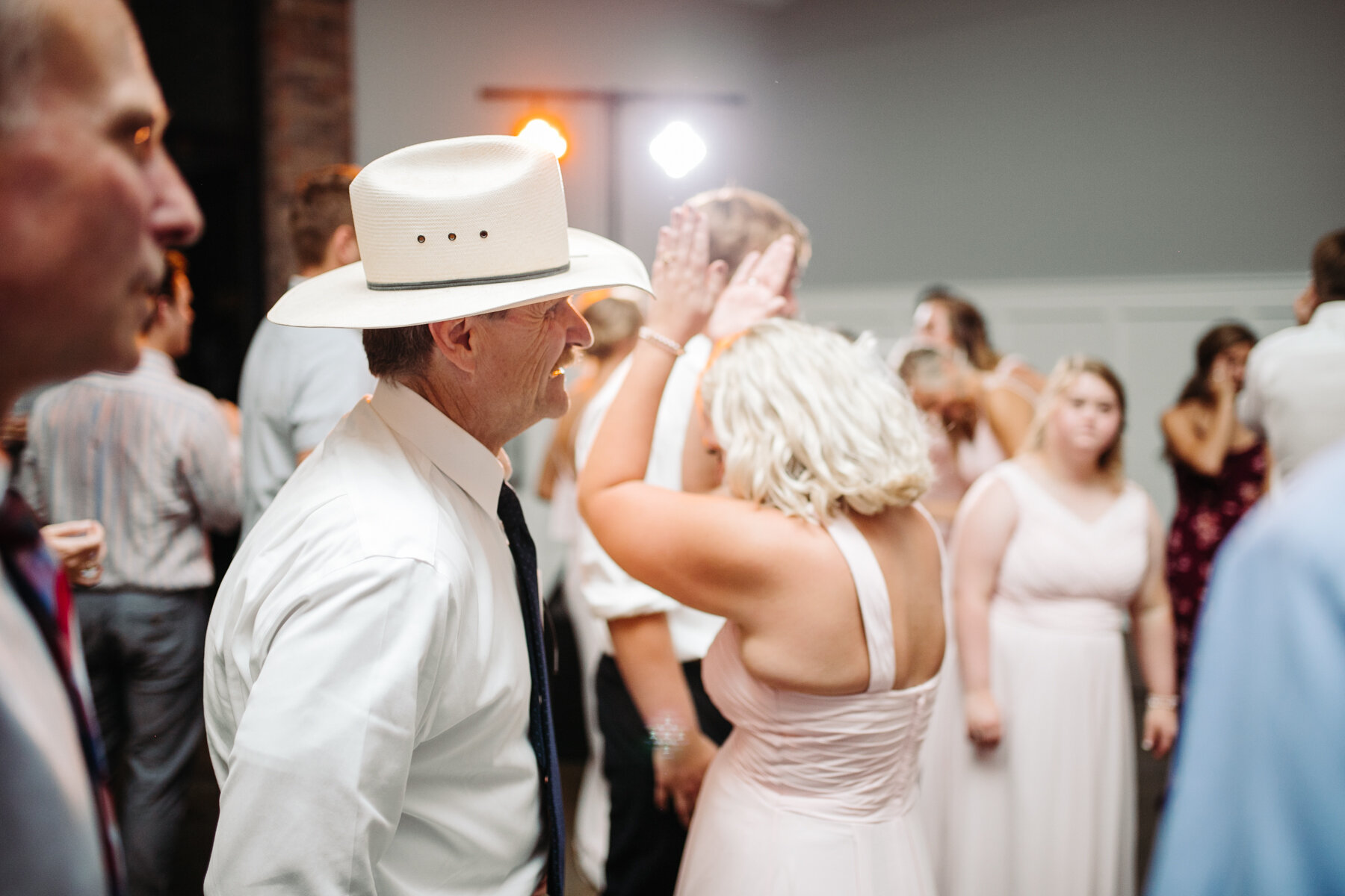 dancing during the reception at a sunny outdoor wedding at hunter valley farms in knoxville tennessee