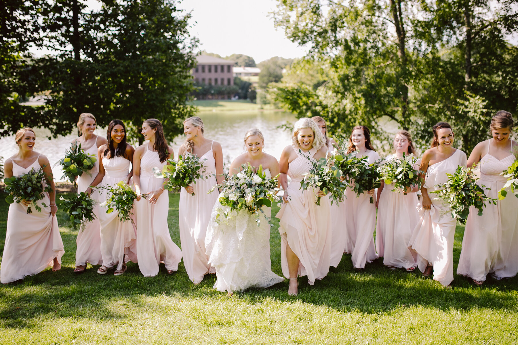 bridal party photos at a sunny outdoor wedding at hunter valley farms in knoxville tennessee