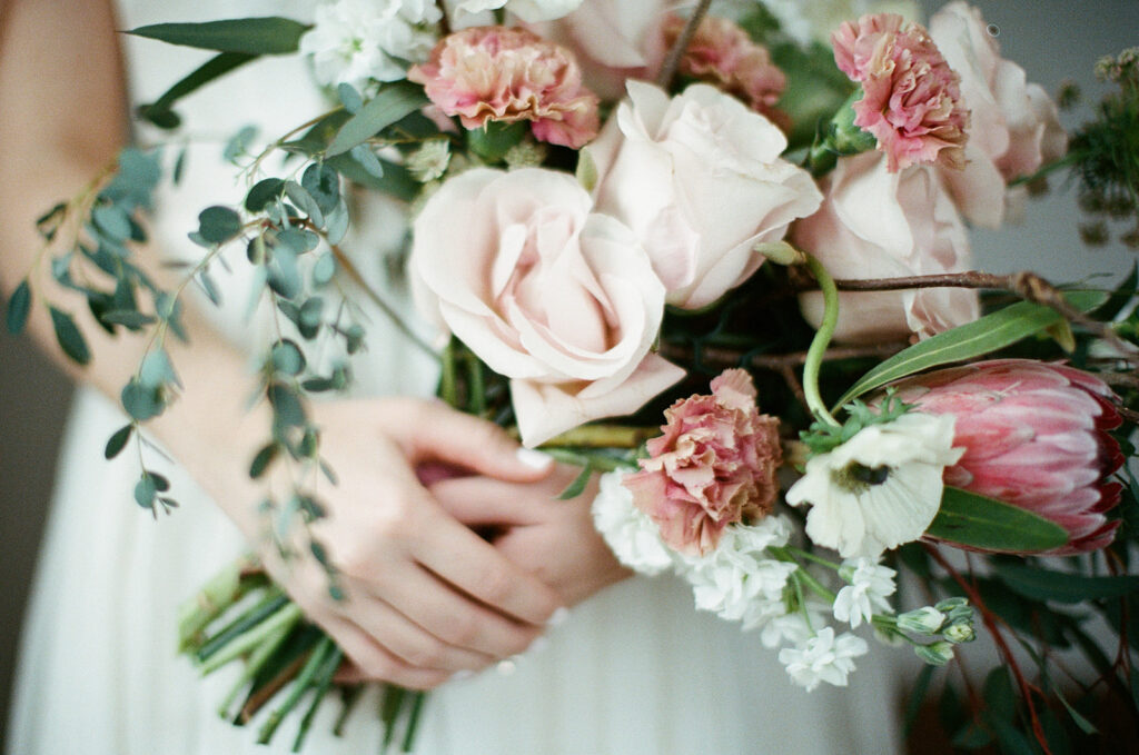 Bouquet in a bride's hands by Nashville Film photographer jamie pratt 